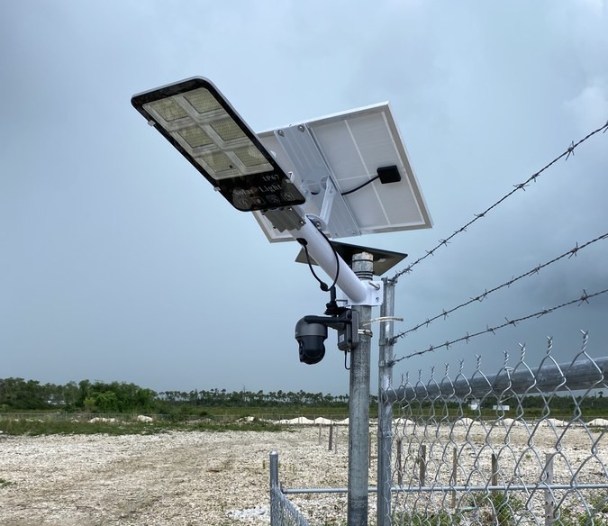 4G solar camera and light combo on perimeter fence